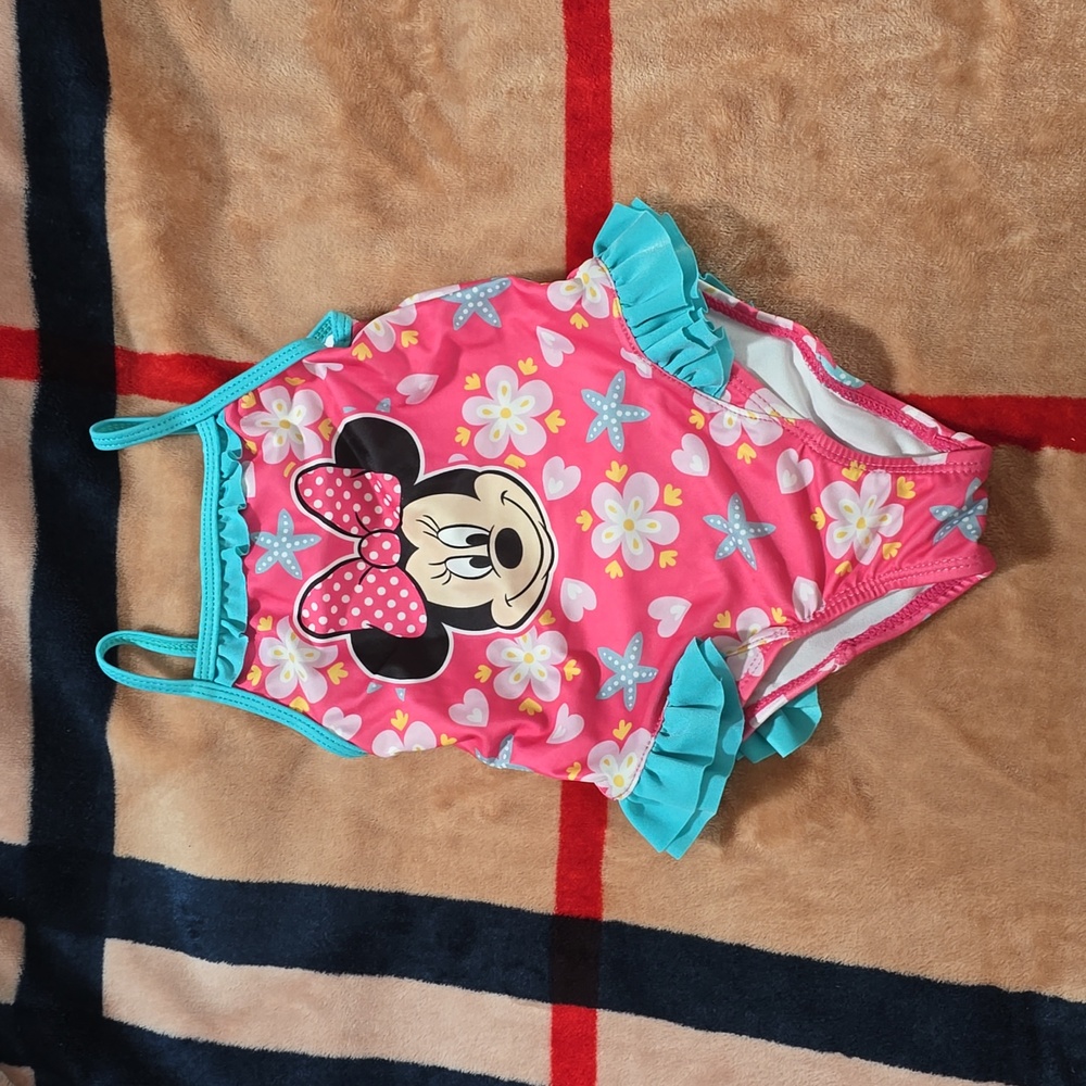 Disney bathing suit. Size: 18 months.